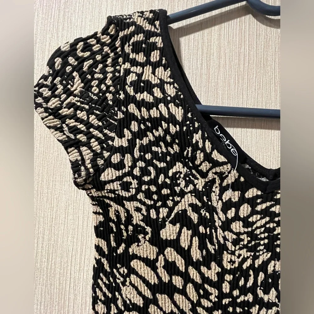 BEBE Stretch Nylon/Spandex w/Gold Metallic Accents Cap Sleeve “V”Neck Mini Dress - Picture 4 of 10